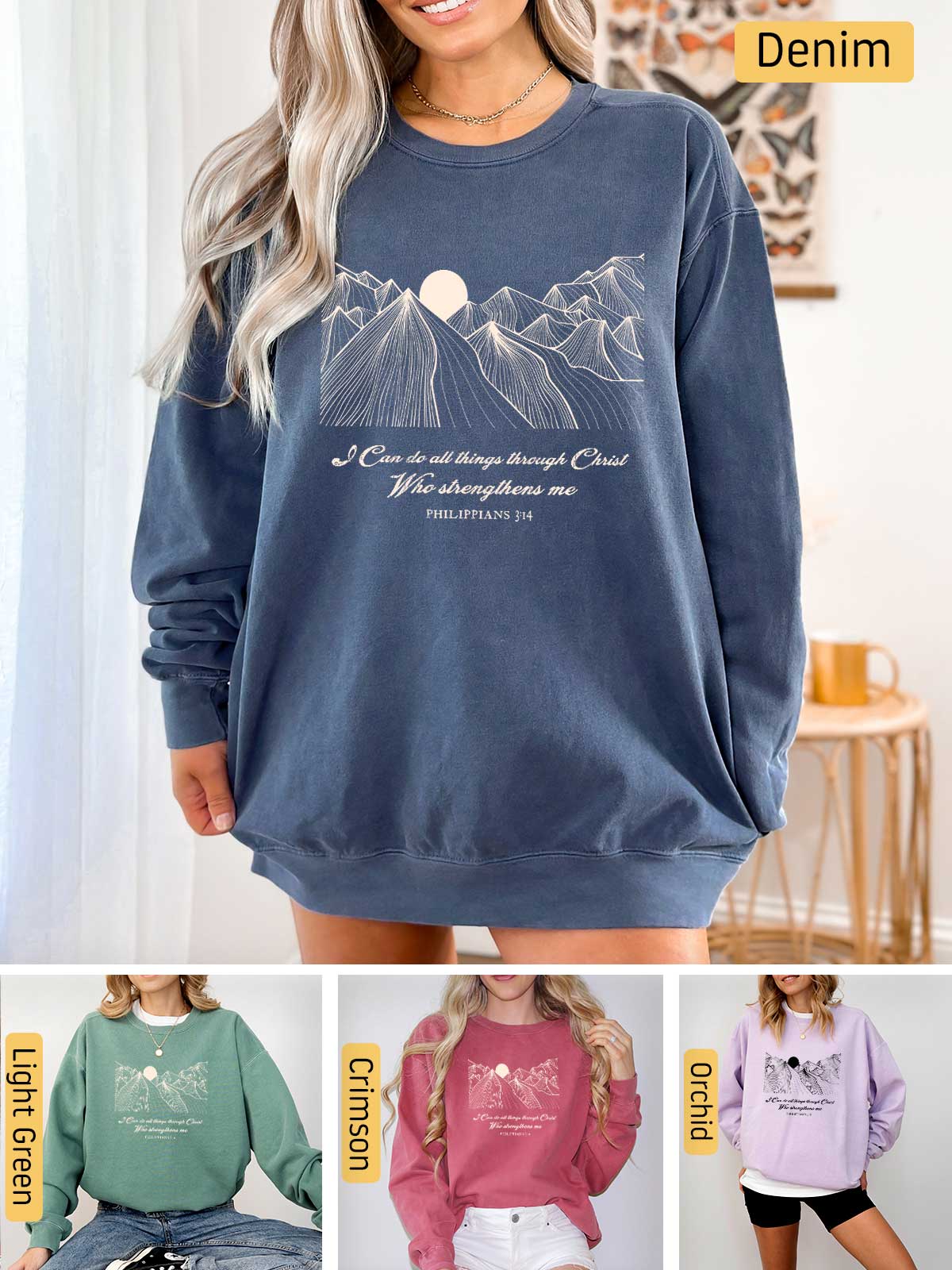a woman wearing a sweatshirt with mountains on it