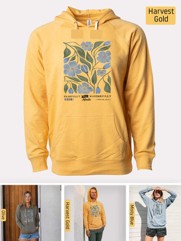 a yellow hoodie with a blue flower on it