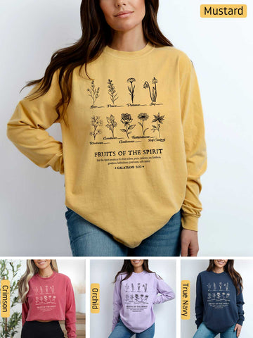 a woman wearing a mustard colored sweatshirt with plants on it