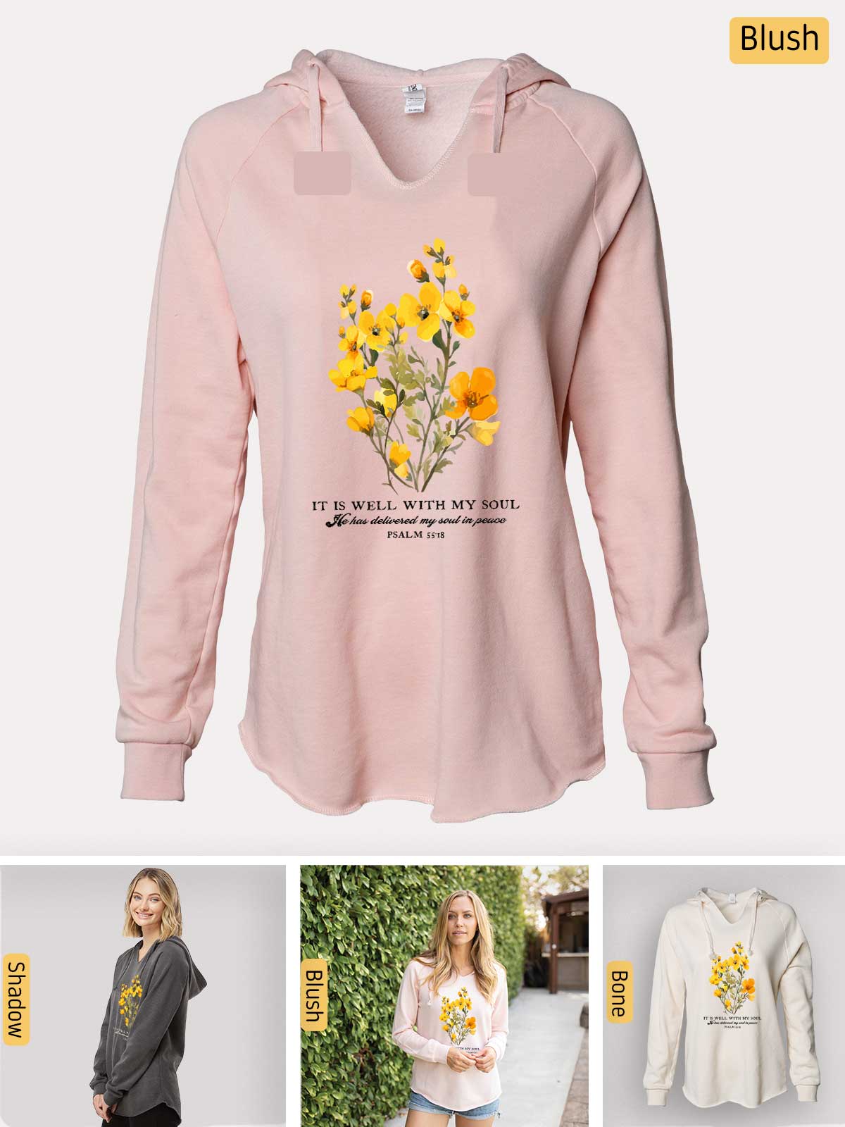 a woman wearing a pink sweatshirt with yellow flowers on it