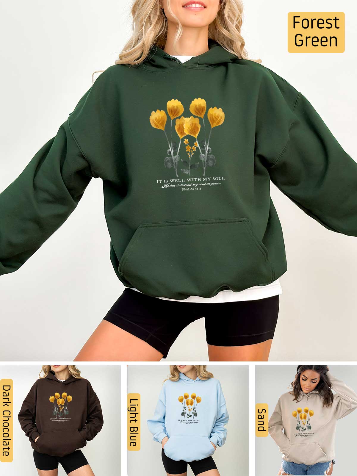 a woman wearing a green hoodie with yellow flowers on it