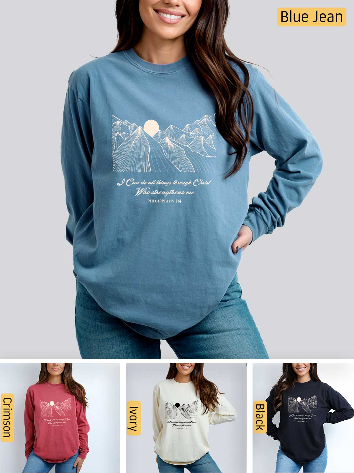 a woman wearing a blue sweatshirt with mountains on it