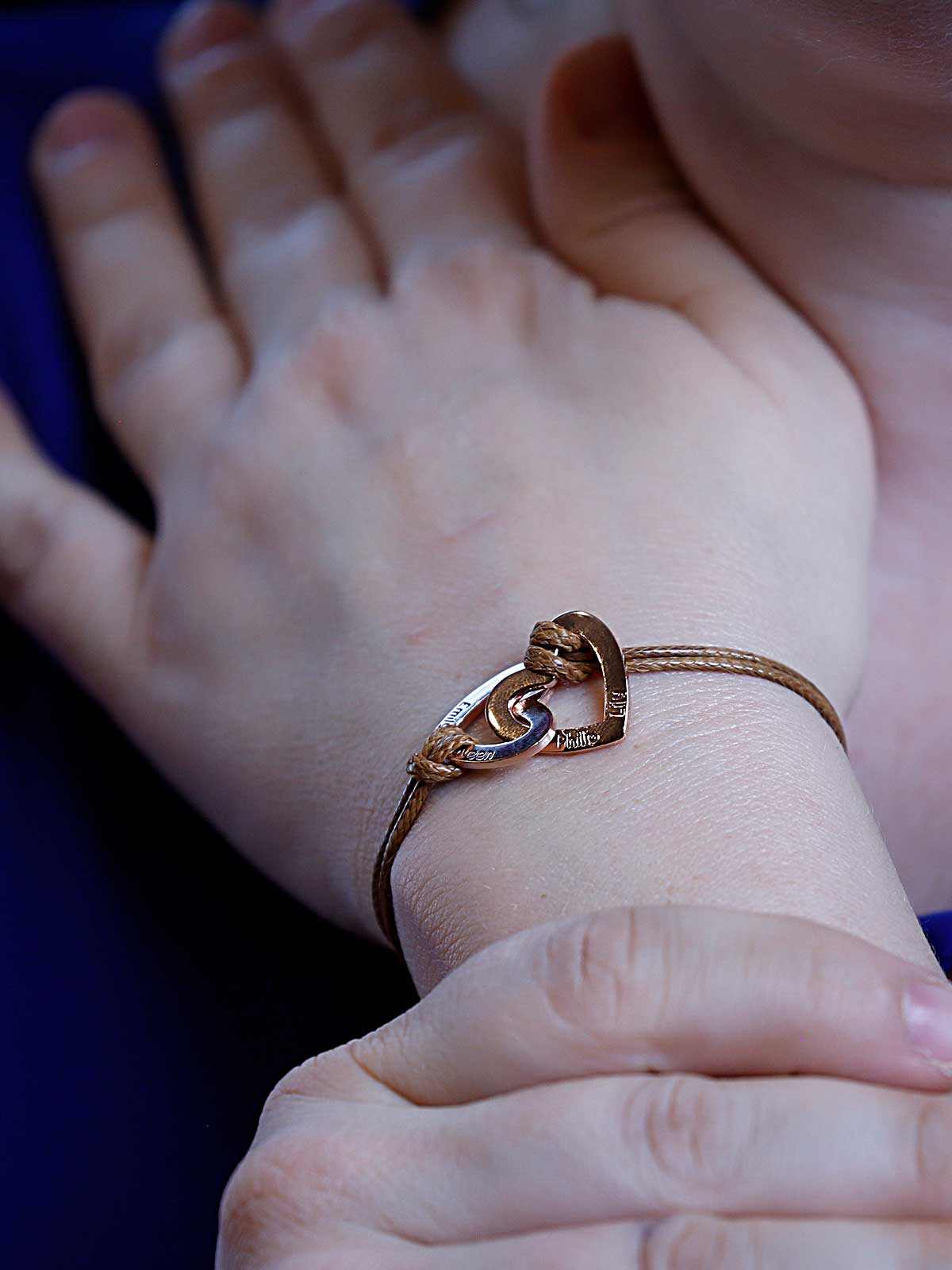 a close up of a person wearing a bracelet