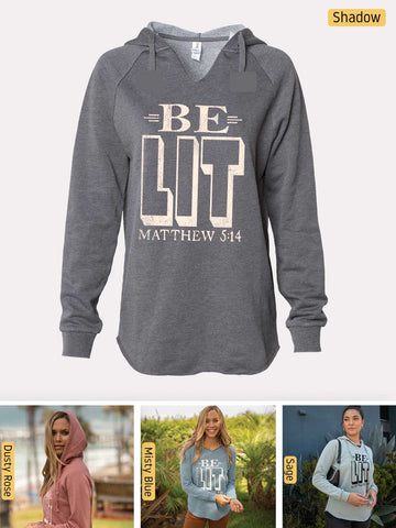 a women's hoodie with a picture of a woman wearing a sweatshirt and